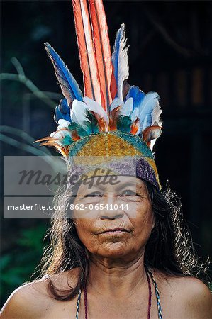 Indian woman with head dress, Ticuna Indian Village of Macedonia, Amazon River, near Puerto Narino, Colombia
