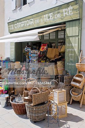 France, Charente Maritime, Ile de Re.  Shop selling baskets and tourist bric a brac in the harbour at St Martin de Re.
