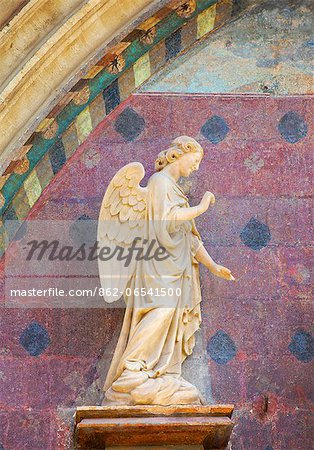 France, Provence, Avignon, Angel sculpture at church entrance