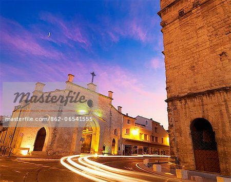 France, Provence, Orange, Eglise Saint Florent at Roman Theatre at dusk