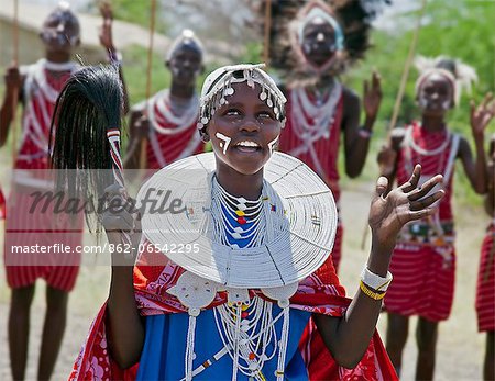 A Maasai schoolgirl sings during an inter schools song and dance competition at Magadi, Kenya