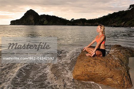 Woman in yoga pose at the Aqua Wellness Resort, Nicaragua, Central America