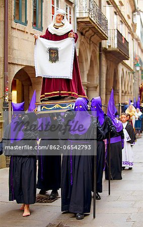 Santiago de Compostela, Galicia, Northern Spain, Nazarenos carrying statue during Semana Santa processions