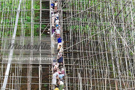 Sri Lanka, North Central Province, Anuradhapura, UNESCO World Heritage Site, Workers and scaffolding on the The Abhayagiri Dagoba