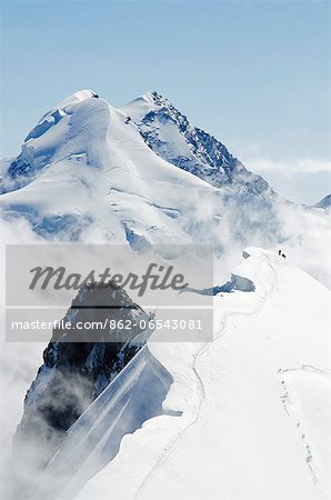 Europe, Switzerland, Swiss Alps, Valais, Zermatt, climbers on Breithorn mountain , 4164m, Liskamm peak