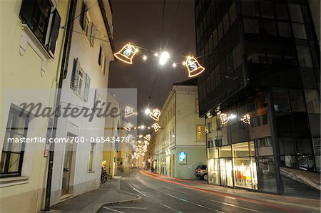 Bell-Shaped Lights Strung Across Street with Streaking Taillights at Night, Sackstrasse, Graz, Styria, Austria