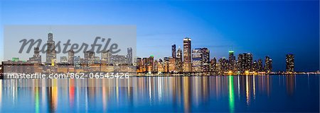 USA, Illinois, Chicago. Dusk view of the skyline from Lake Michigan.