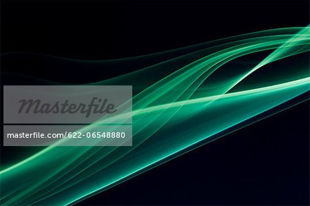 Green smoke on black background Green smoke on black background