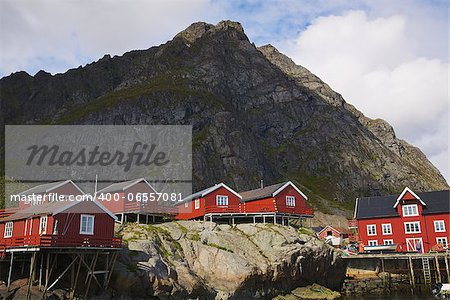 Traditional red rorbu fishing huts on Lofoten islands in Norway