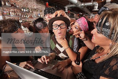 Pretty biker gang women adoring nervous male nerd in bar