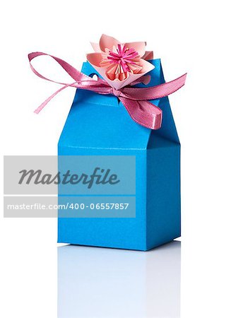 Studio shot of small gift box with decoration. Box isolated on white background.