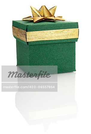 Studio shot of green gift box with gold decoration.