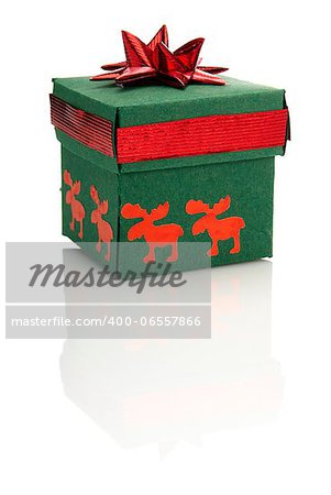 Studio shot of green gift box with red decoration.