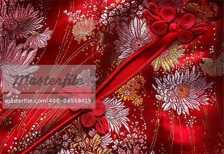 Traditional Chinese Red knot buttons on Cheongsam silk dress details