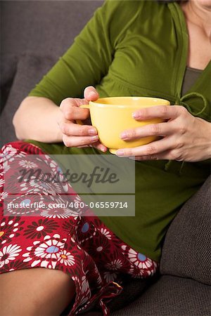 woman portrait holding a bowl in her hands