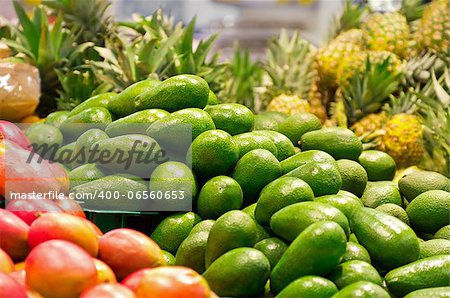 Full box of green Avocado in supermarket