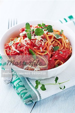 spaghetti with tomato sauce, parmesan and oregano