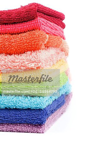 Stack of Rainbow Colored Towels isolated on white background