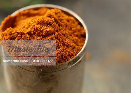 paprika spice in metal bowl macro shot soft focus