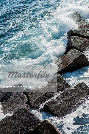 Italy. rocks and waves. Off the coast of syracuse