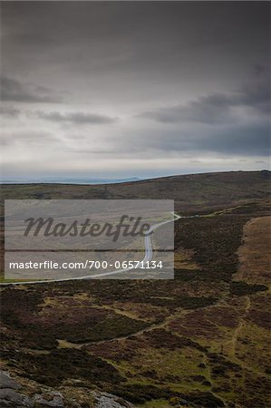 Overview of Winding Road and Storm Clouds, Haytor, Dartmoor National Park, Bovey Tracy, Devon, UK