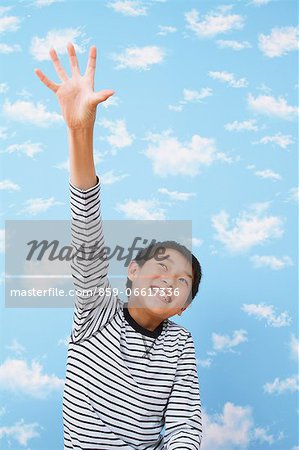 Boy Raising a Hand