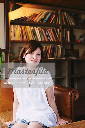 Woman Relaxing In a Cafe