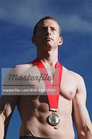 Man Wearing a Gold Medal