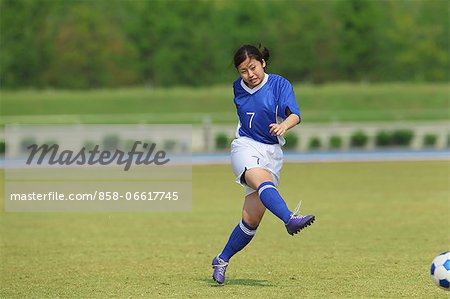 Woman Playing Soccer