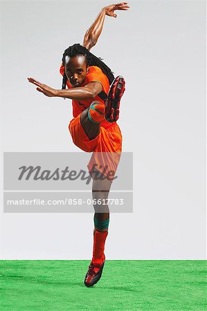 Man In Soccer Uniform With Ball