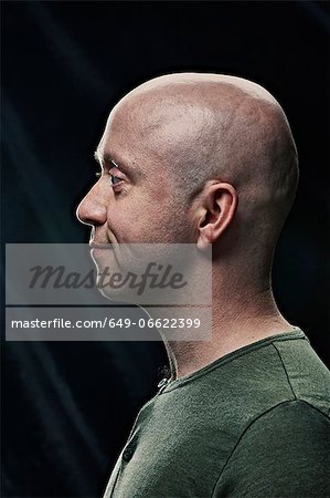 Profile view of bald man