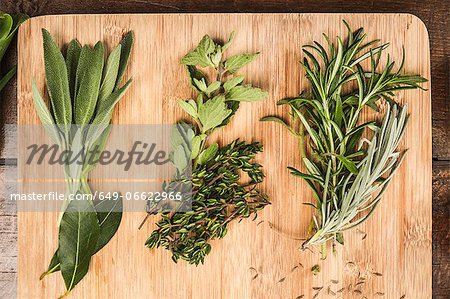 Board with whole leaf herbs