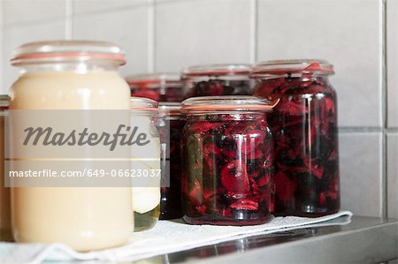 Jars of preserves resting in kitchen