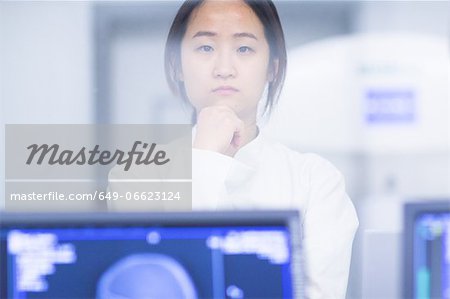 Doctor standing in CT scanner room