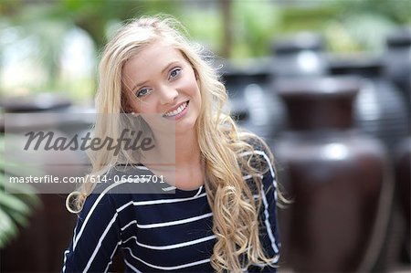 Smiling woman standing outdoors