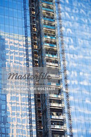 Scaffolding on urban skyscraper