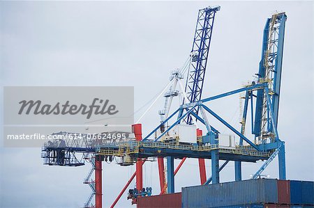 Crane and containers on loading dock