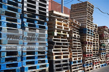 Pallets stacked together in yard