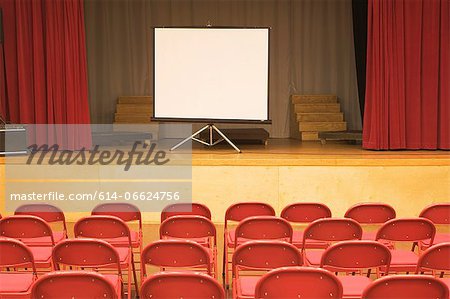 Blank screen in empty auditorium Blank screen in empty auditorium