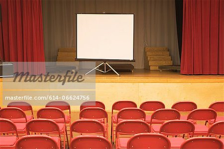 Blank screen in empty auditorium