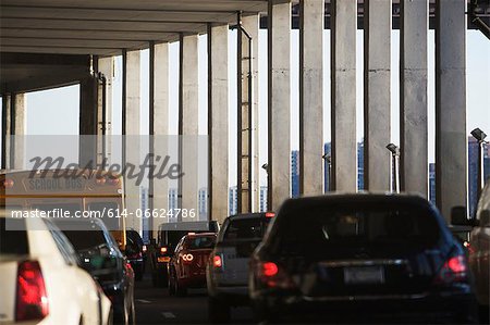 Traffic under urban overpass