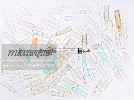 Close up of syringe and vials