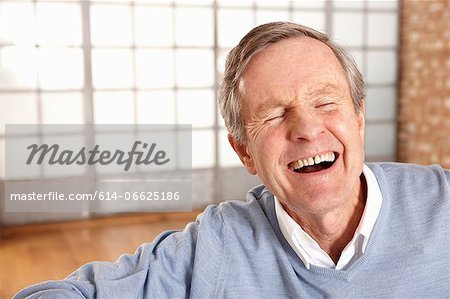 Close up of older man's laughing face