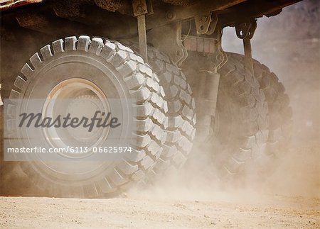 Close up of machinery wheels on site