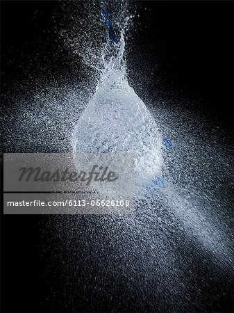 High speed image of water balloon popping High speed image of water balloon popping