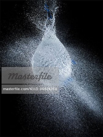 High speed image of water balloon popping