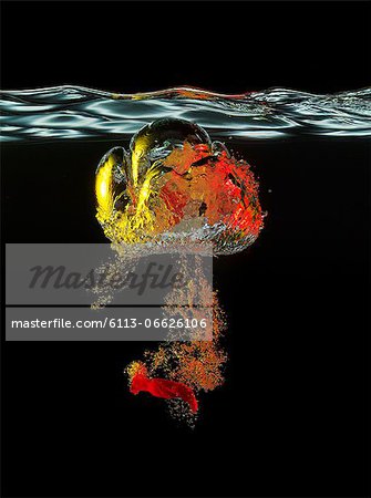 High speed image of balloon popping underwater
