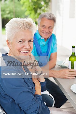 Couple smiling together at table