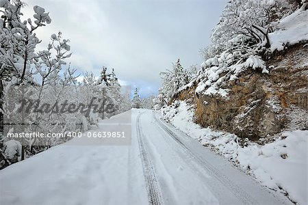 Winter landscape. Winter road and trees covered with snow from Macedonia