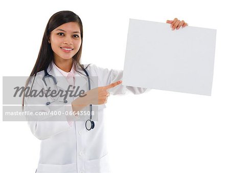 Southeast Asian female medical doctor showing white blank placard, isolated on white background.